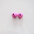 Macro detail of small 14mm pink metal bells for crafts and pet collars - Rose Red