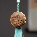 Handcrafted sandalwood mooncake pendant with rabbit carvings and a green tassel - Approx. 4x1.9cm / Green Sandalwood Reunion Style - No Aroma Pill
