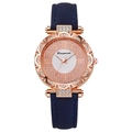 Detail of rose gold watch case with crystal bezel and dark blue leather strap - Blue