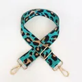 Detail of adjustable emerald green leopard print nylon strap with gold swivel hooks - Emerald Green + Gold Hook
