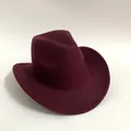 Detail view of burgundy felt wool cowboy hat with classic pinched crown and flat brim - Burgundy