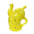 Unique yellow ceramic teapot with black dots and a curved handle on white background - Yellow Pot