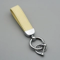Premium beige suede leather car keychain with metallic rings and secure D-shackle hardware - Cream/Silver