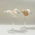 Artistic seashell and glass stem ornament with natural brown textures and cream white finish - Transparent Base Rose Chicoreus Wine Glass