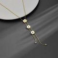 Detailed close-up of 18k gold-plated daisy necklace with dual snake chain and zircon charms - Three Chrysanthemum Tassel Necklace (D104)