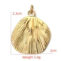 Golden shell-shaped pendant in stainless steel with radial textures 2.3cm x 2cm - BXGPJ089-Polished Shell Pendant