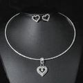 Silver hollow heart jewelry set with sparkling rhinestones on black bust display - Silver Hollow Heart Set