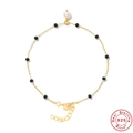 Elegant gold S925 sterling silver bracelet with black beads and a white pearl charm - 925 Silver / Gold-Black