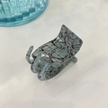 Macro shot of a matte blue hair claw with dark marble patterns and six teeth texture - High Ponytail Approx 3*5cm / Glossy Dark Green