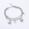 Pulsera de plata de doble capa con colgante de corazón y cuentas sobre cadena de cruz - Color Acero