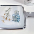 Mini acetate hair claw clip with blue and white marble pattern on silver mirror - Transparent Blue