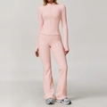 Set da yoga rosa in due pezzi con maglia a maniche lunghe e pantaloni a zampa - Taglia S / Top E Pantaloni / Rosa Pesca
