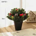 Mini 13cm grüner Weihnachtsbaum mit roten Beeren und Tannenzapfen im schwarzen Topf - Weihnachtsbaum im Topf