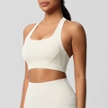 Detail van yoga-bh naden en zijzak op de fitnesslegging met hoge taille voor dames - S / Tops / Licht Ivoor