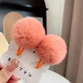 Close-up of fluffy coral pink rabbit fur mini hair clips for girls on display card - One Pair / Orange Pink