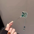 Chinese style metal hair pin with green clover detail and elegant chain tassel pendant - Flower Tassel