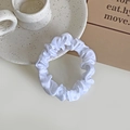 Elegant white satin scrunchie with smooth glossy finish and soft fabric texture - White