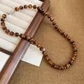 Beaded tiger's eye stone necklace with silver spacers on a vintage jewelry box - 63# Silver Coffee Necklace