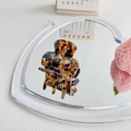 Elegant tortoiseshell patterned mini acetate hair claw clip on a reflective heart mirror - 3.5cm / Marble Brown