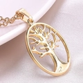Detailed close-up of 18k gold plated stainless steel Tree of Life oval cutout necklace - Gold Necklace