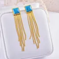 Exaggerated gold tassel earrings with square turquoise stones and long snake chain fringes - Turquoise Square