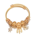 Gouden DIY roestvrijstalen armband met beer, zwaan hangers en amber kristallen - Goud