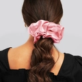 Elegant oversized pink satin scrunchie shown styled on a ponytail for thick hair - Pink