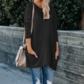 T-shirt noir à manches longues pour femme avec col rond, poches et coupe ample - S / Hauts / Noir