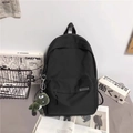 Schwarzer minimalistischer Rucksack mit großem Fassungsvermögen und Dinosaurier-Anhänger - Schwarz Mit Lustigem Drachenanhänger