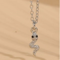 Silver snake pendant necklace with clear zircon stones and black eyes for women - Snake Pendant / Silver