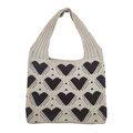 Knitted tote bag in beige with black heart pattern featuring a flexible structure - Khaki