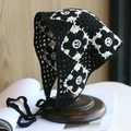 Handmade crochet cherry bandana with black and white flower patterns and ties - Black White Grid Flower