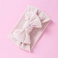 Detail of soft waffle knit texture and large bow on pink infant headband - Beige Pink-Bow