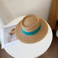 Detailed top view of a flat top straw sun hat with a blue ribbon on a white table - M (56-58cm) / Khaki Fedora-Lake Blue Ribbon