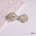 Eleganter goldener Haarclip in Schleifenform mit Strasssteinen, Länge ca. 6,5 cm - Goldene Strass-Schleife (S223-19)