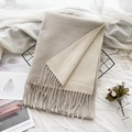 Two-tone beige and taupe cashmere-feel scarf with fringe hem in a lifestyle setting - 29# Nude Pink