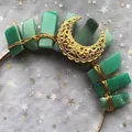 Detailed macro of gold moon crown with hand-wrapped green crystals and crescent moon - Gold Headband/Large Gold Moon/Aventurine Crystal