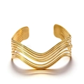 Detailed view of gold geometric wavy cuff bracelet with parallel metallic layers - Multi-layer Wave Lines Style (2-DQ-W-001)