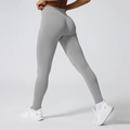 Leggings de yoga taille haute sans couture en gris clair avec effet push-up fessier - Gris clair