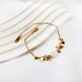 Elegante bracciale a sfere dorate con gemma rosa e ciondoli tondi su sfondo bianco - Stile Pietra Ovale Rosa (BR26150AG)