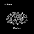 Macro view of 4x5mm medium transparent silicone earring backs on a black background - 1000Pcs/Bag / 5mm Bullet