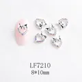 Bijoux d'ongles cœur argenté avec nœuds en cristal et strass aurora (8x10mm) - Cœur argenté ajouré avec nœud strass AB (LF7210)