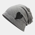Detail of grey knitted beanie featuring black heart patch with DREMA text embroidery - M (56-58cm) / Gray