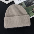 Detail of soft ribbed knit texture and plush rabbit fur on thick grey winter beanie - M (56-58cm) / Mocha