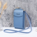 Vertical light blue crossbody phone bag in pebble grain faux leather for women - Blue