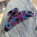 Large acetate hair claw clip with vibrant blue and magenta abstract striped pattern - Translucent Blue Purple