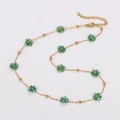 Vintage stainless steel necklace with green crystal flower beads in gold finish - Green Necklace Style