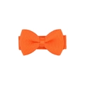 Close-up of orange fabric bow clip showing detailed ribbed texture and soft material - Orange