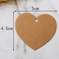 Macro detail of brown heart-shaped kraft paper gift tag measuring 5cm by 4.5cm - Kraft Brown (100 Pcs)