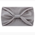 Grey elastic yoga headband featuring a stylish knotted bow design in soft fabric - Light Gray